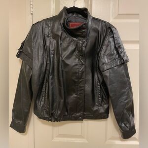 Rare Find! Vintage Sergio Valente Black Leather Jacket with detachable sleeves!